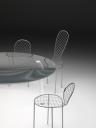 стенд фирмы Living Divani, прозрачный стол Drop и стулья Family Chairs