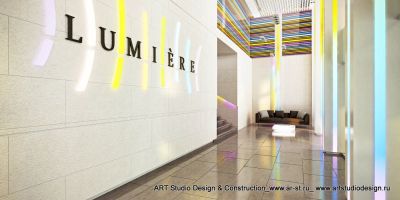 Отделка холла в жилом комплексе Lumiere
Изначально мы предложили использовать в отделке холла почти чисто белый керамогранит. Впрочем, позже от этого решения пришлось отказаться в пользу более практичного. Также яркие аксессуары и мебель были заменены на более простые по форме и спокойные по цвету. Впрочем, это ничуть не повредило общему решению холла. 
Keywords: дизайн-проект от ART Studio Design & Construction